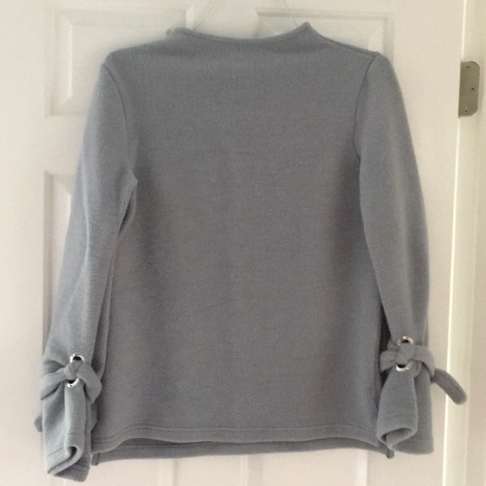 Blue fleece sweater.
